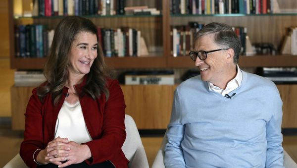 In this Feb. 1, 2019, Bill and Melinda Gates look toward each other and smile while being interviewed in Kirkland, Wash. The couple, whose foundation has the largest endowment in the world, are pushing back against a new wave of criticism about whether billionaire philanthropy is a force for good - Sputnik International
