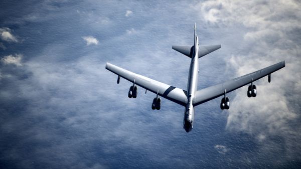 A U.S. Air Force B-52 Stratofortress breaks away from a KC-135 Stratotanker from the 100th Air Refueling Wing, RAF Mildenhall, England, after receiving fuel during a strategic bomber mission, May 7, 2020. - Sputnik International