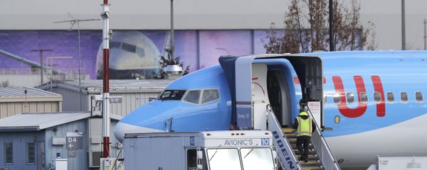 A worker walks up steps to the right of an avionics truck parked next to a Boeing 737 MAX 8 airplane being built for TUI Group at Boeing Co.'s Renton Assembly Plant Wednesday, March 13, 2019, in Renton, Wash A worker walks up steps to the right of an avionics truck parked next to a Boeing 737 MAX 8 airplane being built for TUI Group at Boeing Co.'s Renton Assembly Plant Wednesday, March 13, 2019, in Renton, Wash - Sputnik International