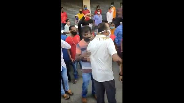 Ruckus at Kalasipalya Bangalore. Street vendors defy BBMP and Health officials when they asked them to close shops COVID19 . Instead they threw cow dung at them - Sputnik International