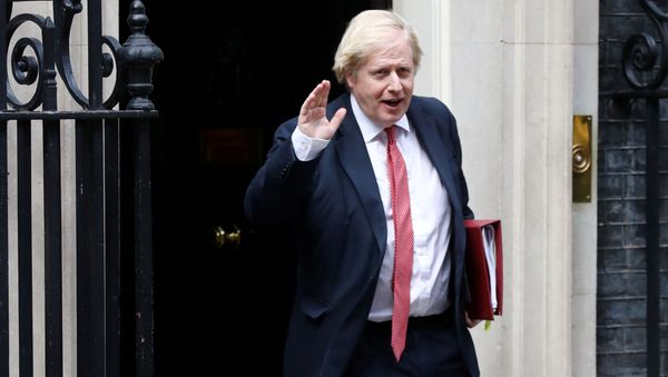 Britain's Prime Minister Boris Johnson leaves 10 Downing Street, following the outbreak of the coronavirus disease (COVID-19), London, Britain, May 11, 2020 Britain's Prime Minister Boris Johnson leaves 10 Downing Street, following the outbreak of the coronavirus disease (COVID-19), London, Britain, May 11, 2020 - Sputnik International