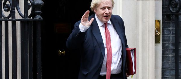 Britain's Prime Minister Boris Johnson leaves 10 Downing Street, following the outbreak of the coronavirus disease (COVID-19), London, Britain, May 11, 2020 Britain's Prime Minister Boris Johnson leaves 10 Downing Street, following the outbreak of the coronavirus disease (COVID-19), London, Britain, May 11, 2020 - Sputnik International