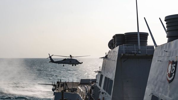 An MH-60 Sea Hawk helicopter, assigned to the “Warlords” of Helicopter Maritime Strike Squadron (HSM) 51, takes off from the flight deck aboard the Arleigh Burke-class guided-missile destroyer USS McCampbell (DDG 85) while conducting underway operations in support of stability and security for a free and open Indo-Pacific. - Sputnik International
