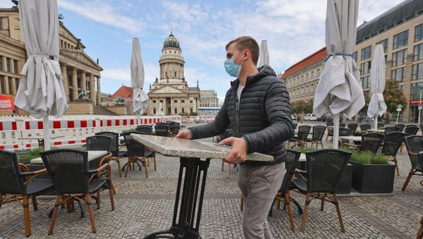 Staff of the restaurant Shan Rahimkahn prepare for the reopening, as the country loosens the coronavirus disease (COVID-19) restrictions at Gendarmenmarkt square in Berlin, Germany, May 14, 2020 - Sputnik International