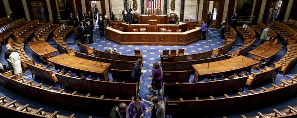 The chamber of the House of Representatives empties following a joint meeting of Congress, at the Capitol in Washington, Thursday, Sept. 18, 2014, with visiting Ukranian President Petro Poroshenko. The House and Senate are wrapping up business and heading to their home states for the weeks leading up to the midterm elections - Sputnik International