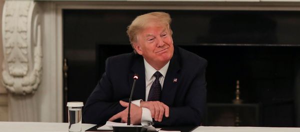 U.S. President Donald Trump speaks with restaurant executives and industry leaders during a coronavirus disease (COVID-19) pandemic meeting in the State Dining Room at the White House in Washington, U.S., May 18, 2020. - Sputnik International