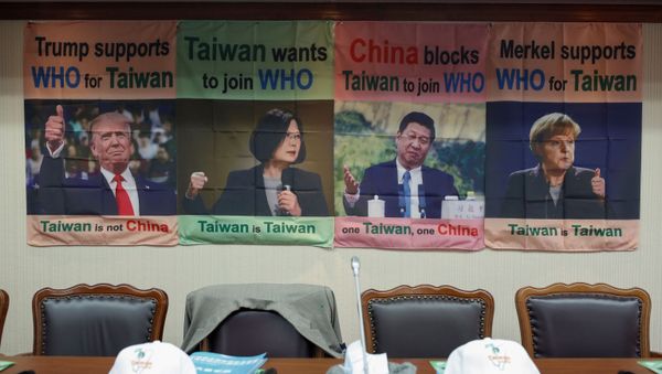 A banner with pictures of world leaders is seen before Taiwan's Health Minister Chen Shih-chung news conference about Taiwan's efforts to get into the World Health Organisation in Taipei, Taiwan, May 15, 2020. - Sputnik International