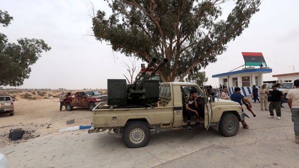 Fighters loyal to Libya's internationally recognised government are seen after taking control of Watiya airbase, southwest of Tripoli, Libya May 18, 2020.  - Sputnik International
