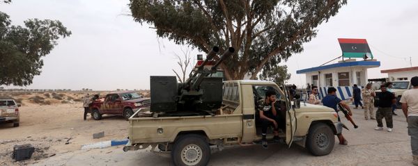 Fighters loyal to Libya's internationally recognised government are seen after taking control of Watiya airbase, southwest of Tripoli, Libya May 18, 2020. Fighters loyal to Libya's internationally recognised government are seen after taking control of Watiya airbase, southwest of Tripoli, Libya May 18, 2020. - Sputnik International