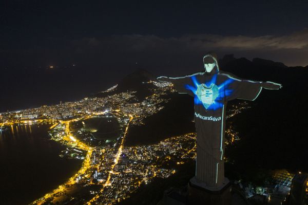 In this 3 May 2020 photo, the iconic Christ the Redeemer statue is lit up as if wearing a protective mask and features a hashtag that reads Mask saves in Portuguese, amid the new coronavirus pandemic in Rio de Janeiro, Brazil. In this 3 May 2020 photo, the iconic Christ the Redeemer statue is lit up as if wearing a protective mask and features a hashtag that reads Mask saves in Portuguese, amid the new coronavirus pandemic in Rio de Janeiro, Brazil. - Sputnik International