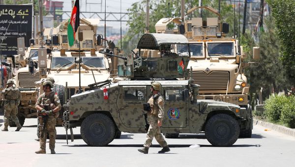 Afghan security forces stand guard outside a hospital which came under attack in Kabul - Sputnik International