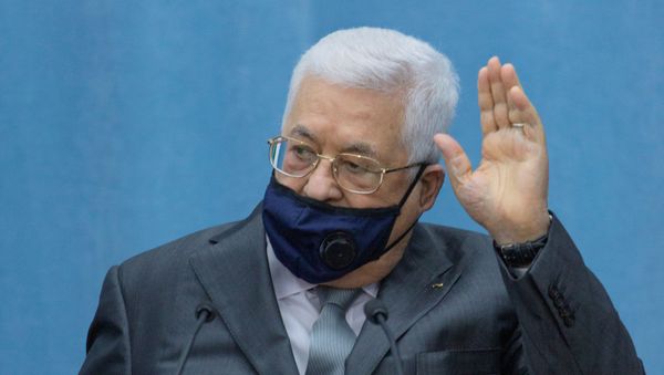 Palestinian President Mahmoud Abbas wears a mask as he heads the Palestinian leadership meeting at his headquarters, in Ramallah in the Israeli-occupied West Bank May 7, 2020 Palestinian President Mahmoud Abbas wears a mask as he heads the Palestinian leadership meeting at his headquarters, in Ramallah in the Israeli-occupied West Bank May 7, 2020 - Sputnik International