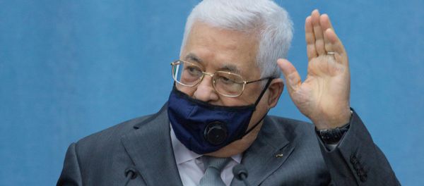 Palestinian President Mahmoud Abbas wears a mask as he heads the Palestinian leadership meeting at his headquarters, in Ramallah in the Israeli-occupied West Bank May 7, 2020 Palestinian President Mahmoud Abbas wears a mask as he heads the Palestinian leadership meeting at his headquarters, in Ramallah in the Israeli-occupied West Bank May 7, 2020 - Sputnik International