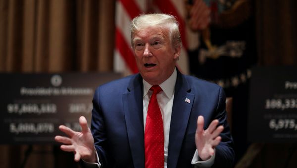 US President Donald Trump speaks about the coronavirus disease (COVID-19) pandemic response during a meeting with Kansas Governor Laura Kelly and Arkansas Governor Asa Hutchinson in the Cabinet Room at the White House in Washington, U.S., May 20, 2020 US President Donald Trump speaks about the coronavirus disease (COVID-19) pandemic response during a meeting with Kansas Governor Laura Kelly and Arkansas Governor Asa Hutchinson in the Cabinet Room at the White House in Washington, U.S., May 20, 2020 - Sputnik International
