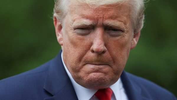 U.S. President Donald Trump talks to reporters as he departs on travel for a coronavirus disease (COVID-19) response event at a ventilator plant in Ypsilanti, Michigan from the South Lawn of the White House in Washington, U.S., May 21, 2020.  - Sputnik International