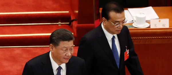 Chinese President Xi Jinping and Premier Li Keqiang arrive at the opening session of the National People's Congress (NPC) at the Great Hall of the People in Beijing, China May 22, 2020 Chinese President Xi Jinping and Premier Li Keqiang arrive at the opening session of the National People's Congress (NPC) at the Great Hall of the People in Beijing, China May 22, 2020 - Sputnik International