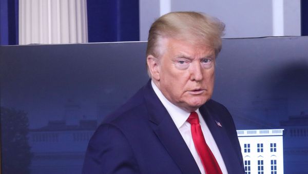U.S. President Donald Trump arrives to make a statement to reporters about reopening places of worship across the United States by declaring them essential during the coronavirus disease (COVID-19) pandemic in the Brady Press Briefing Room at the White House in Washington, U.S., May 22, 2020 - Sputnik International