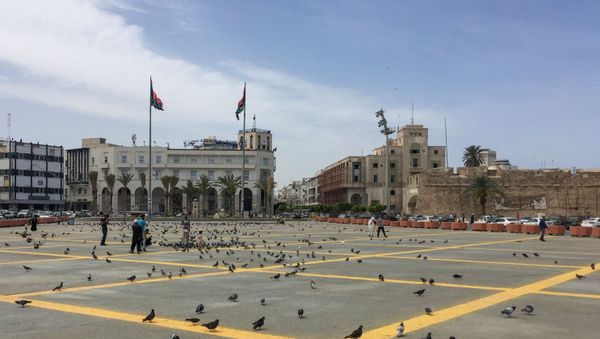 People are seen at Martyrs' Square following the outbreak of the coronavirus disease (COVID-19), during the holy month of Ramadan in Tripoli, Libya April 29, 2020 - Sputnik International