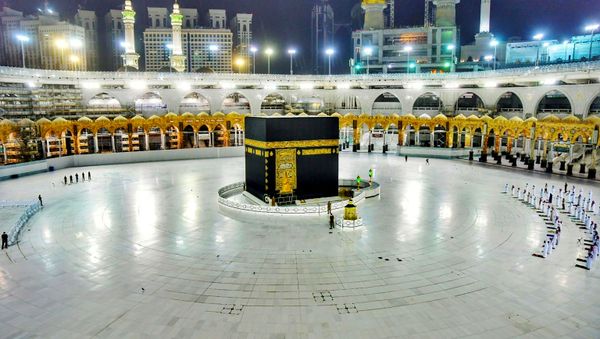 Muslims pray during the Laylat al-Qadr, or Night of Power, the holiest night for Muslims, while practicing social distancing, following the outbreak of the coronavirus disease (COVID-19), during the fasting month of Ramadan, at the Grand Mosque in Mecca, Saudi Arabia May 19, 2020.  - Sputnik International