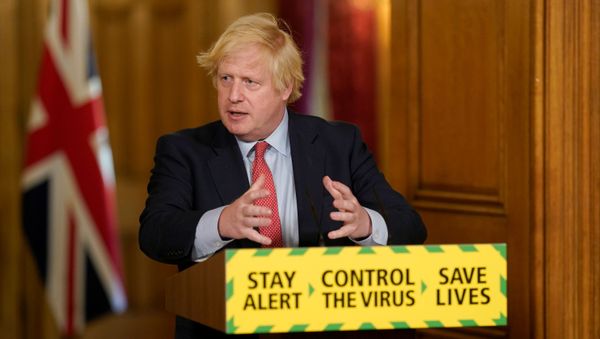 Britain's Prime Minister Boris Johnson holds a daily news conference with Public Health England's (PHE) Medical Director Yvonne Doyle (not pictured), on the coronavirus disease (COVID-19) outbreak, at 10 Downing Street in London, Britain May 25, 2020 Britain's Prime Minister Boris Johnson holds a daily news conference with Public Health England's (PHE) Medical Director Yvonne Doyle (not pictured), on the coronavirus disease (COVID-19) outbreak, at 10 Downing Street in London, Britain May 25, 2020 - Sputnik International