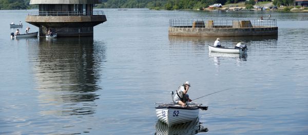 People are seen fishing from boats at Bewl Water Country Park, following the outbreak of the coronavirus disease (COVID-19), Wadhurst, Britain, May 27, 2020.  - Sputnik International