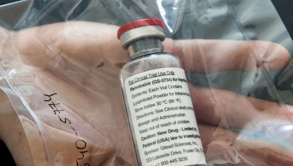 An ampule of remdesivir is pictured during a news conference at the University Hospital Eppendorf (UKE) in Hamburg, Germany, April 8, 2020, as the spread of coronavirus disease (COVID-19) continues. - Sputnik International