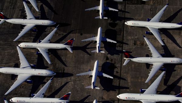  Delta Air Lines passenger planes are seen parked due to flight reductions made to slow the spread of coronavirus disease (COVID-19), at Birmingham-Shuttlesworth International Airport in Birmingham, Alabama, 25 March 2020 - Sputnik International
