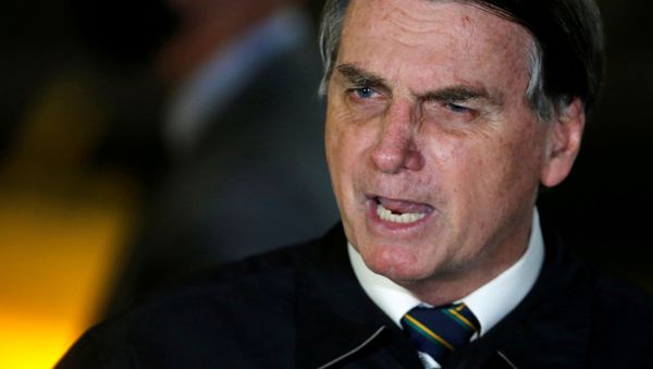 Brazil's President Jair Bolsonaro speaks with journalists as he arrives at Alvorada Palace, amid the coronavirus disease (COVID-19) outbreak, in Brasilia, Brazil, May 22, 2020 - Sputnik International