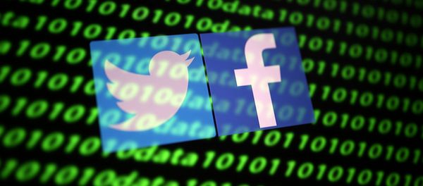  The Twitter and Facebook logo along with binary cyber codes are seen in this illustration taken November 26, 2019 - Sputnik International