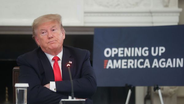 US President Donald Trump speaks during a roundtable discussion with industry executives on reopening businesses during the coronavirus disease (COVID-19) pandemic in the State Dining Room at the White House in Washington, U.S., May 29, 2020 - Sputnik International