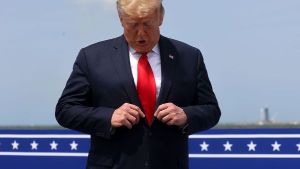 U.S. President Donald Trump is seen after the launch of a SpaceX Falcon 9 rocket and Crew Dragon spacecraft on NASA's SpaceX Demo-2 mission to the International Space Station from NASA's Kennedy Space Center in Cape Canaveral, Florida, U.S.  May 30, 2020.  - Sputnik International