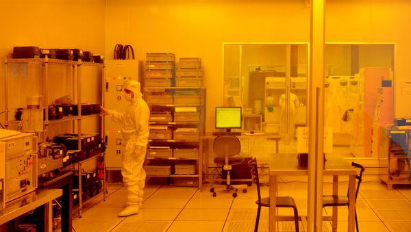 Researchers wearing bunny suits work inside the semiconductor fabrication lab at the Centre for Nano Science and Engineering (CENSe), situated at the Indian Institute of Science (IISc), in Bangalore on June 30, 2018 - Sputnik International