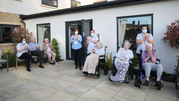 Care workers and residents of the Scisset Mount Care Home react during the last day of the Clap for our Carers campaign in support of the NHS, following the outbreak of the coronavirus disease (COVID-19), Huddersfield, Britain, May 28, 2020 Care workers and residents of the Scisset Mount Care Home react during the last day of the Clap for our Carers campaign in support of the NHS, following the outbreak of the coronavirus disease (COVID-19), Huddersfield, Britain, May 28, 2020 - Sputnik International
