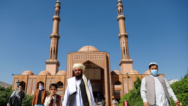 Afghans leave after prayers during Eid al-Fitr, the Muslim festival marking the end the holy fasting month of Ramadan, at a mosque, amid the spread of the coronavirus disease (COVID-19), in Kabul, Afghanistan May 24, 2020 - Sputnik International