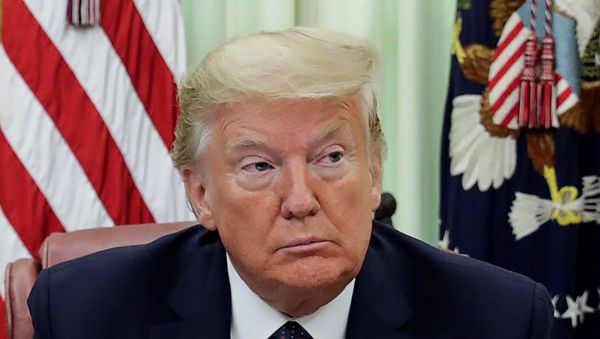 U.S. President Donald Trump is seated prior to signing an executive order regarding social media companies in the Oval Office of the White House in Washington, U.S., May 28, 2020. - Sputnik International