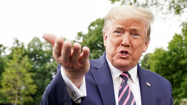 U.S. President Donald Trump speaks to reporters as he departs on travel to Phoenix, Arizona from the South Lawn of the White House in Washington, U.S., May 5, 2020.  - Sputnik International