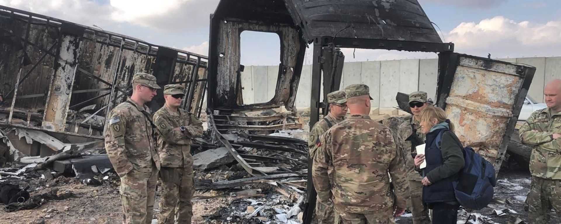US Soldiers stand amid damage at a site of an Iranian bombing at Ain al-Asad Air Base, in Anbar, Iraq, Monday, 13 January 2020. Ain al-Asad Air Base was struck by a barrage of Iranian missiles on Wednesday, in retaliation for the US drone strike that killed a top Iranian commander, General Qassem Soleimani, whose killing raised fears of a wider war in the Middle East. US Soldiers stand amid damage at a site of an Iranian bombing at Ain al-Asad Air Base, in Anbar, Iraq, Monday, 13 January 2020. Ain al-Asad Air Base was struck by a barrage of Iranian missiles on Wednesday, in retaliation for the US drone strike that killed a top Iranian commander, General Qassem Soleimani, whose killing raised fears of a wider war in the Middle East. - Sputnik International, 1920, 17.12.2021