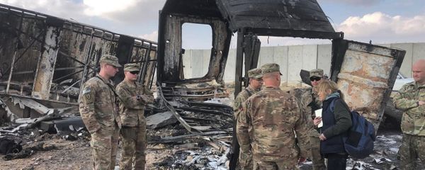 U.S. Soldiers stand amid damage at a site of Iranian bombing at Ain al-Asad air base, in Anbar, Iraq, Monday, Jan. 13, 2020. Ain al-Asad air base was struck by a barrage of Iranian missiles on Wednesday, in retaliation for the U.S. drone strike that killed atop Iranian commander, Gen. Qassem Soleimani, whose killing raised fears of a wider war in the Middle East.  - Sputnik International