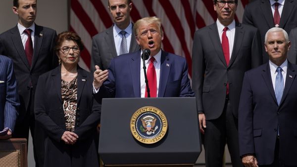 President Donald Trump speaks during a news conference in the Rose Garden of the White House, Friday, June 5, 2020, in Washington. Front row from left, Small Business Administration administrator Jovita Carranza, Trump, and Vice President Mike Pence. Back row from left, member of Council of Economic Advisers Tyler Goodspeed, Labor Secretary Eugene Scalia, Treasury Secretary Steven Mnuchin, and Chairman of the Council of Economic Advisers Tomas Philipson.(AP Photo/Evan Vucci) President Donald Trump speaks during a news conference in the Rose Garden of the White House, Friday, June 5, 2020, in Washington. Front row from left, Small Business Administration administrator Jovita Carranza, Trump, and Vice President Mike Pence. Back row from left, member of Council of Economic Advisers Tyler Goodspeed, Labor Secretary Eugene Scalia, Treasury Secretary Steven Mnuchin, and Chairman of the Council of Economic Advisers Tomas Philipson.(AP Photo/Evan Vucci) - Sputnik International