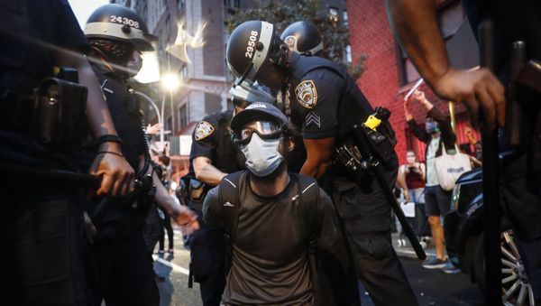 A protester is arrested by New York Police Department officers on Park Avenue after violating curfew, Friday, June 5, 2020, in New York. - Sputnik International