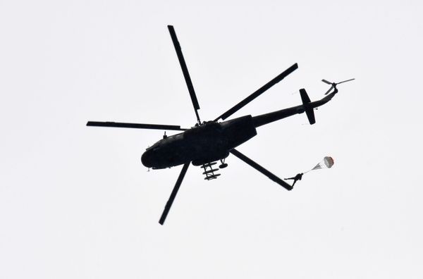 A recruit jumping out of a helicopter during a training at the Enem airfield of Russia's Volunteer Society for Cooperation with the Army, Aviation, and Navy (DOSAAF) in the Krasnodar Territory A recruit jumping out of a helicopter during a training at the Enem airfield of Russia's Volunteer Society for Cooperation with the Army, Aviation, and Navy (DOSAAF) in the Krasnodar Territory - Sputnik International