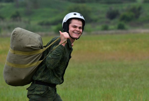 A recruit reacting to his first parachute jump at the Enem airfield in the Krasnodar Territory, Russia A recruit reacting to his first parachute jump at the Enem airfield in the Krasnodar Territory, Russia - Sputnik International