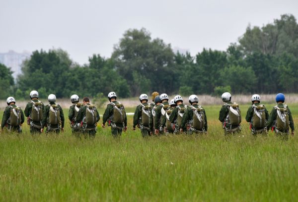 Recruits are leaving the airfield after accomplishing first parachute jump in the Krasnodar Territory, Russia Recruits are leaving the airfield after accomplishing first parachute jump in the Krasnodar Territory, Russia - Sputnik International