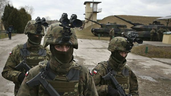 In this photo taken March 10, 2019, in Wesola,near Warsaw, central Poland, are seen Polish troops in combat gear during brief exercise with some other NATO forces marking 20 years since Poland, the Czech Republic and Hungary joined the Western military alliance - Sputnik International