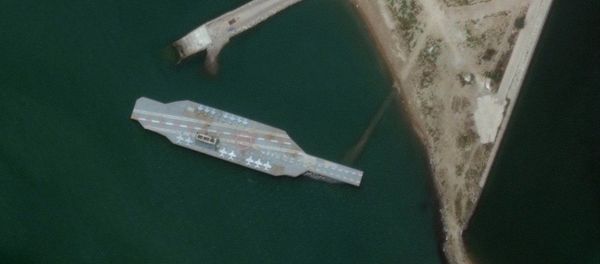 In this Sunday, June 7, 2020 satellite photo provided by Maxar Technologies, a fake aircraft carrier is seen off the coast of Bandar Abbas, Iran. - Sputnik International