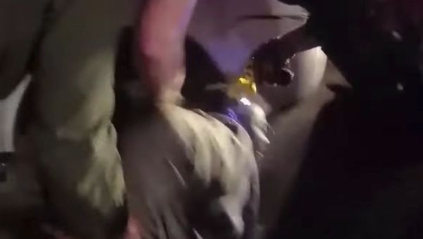 Newly released body camera footage offers additional insight into the in-custody death of Texas resident Javier Ambler, who was involved in a 22-minute police chase over a minor traffic violation. - Sputnik International
