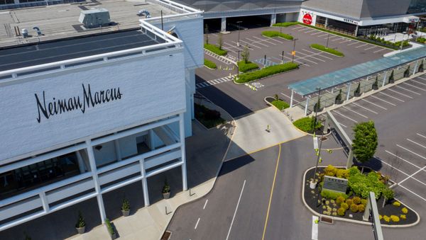 A Neiman Marcus department store stands next to empty parking lots at the King of Prussia Mall which remains closed due to the ongoing outbreak of the coronavirus disease (COVID-19) in Upper Merion Township, Pennsylvania U.S., May 21, 2020 - Sputnik International