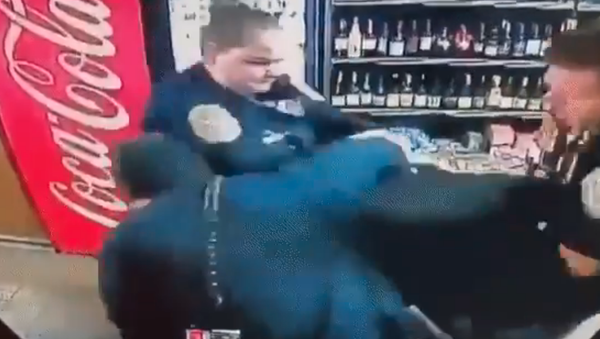 Decatur PD had body cam footage it showed at the press conference today. The chief said the store owner - who called them to report a robbery - was reaching for a gun when he was punched. - Sputnik International