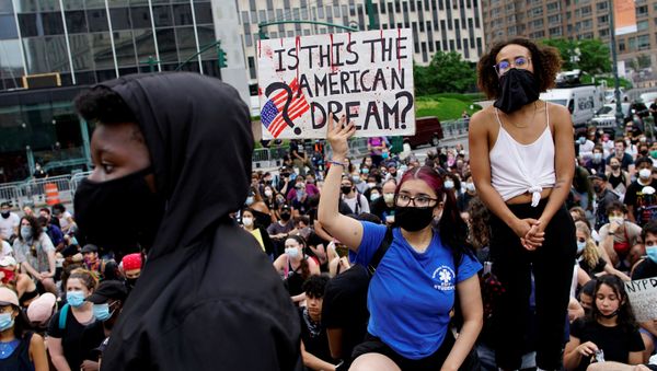 Demonstrator raises his fist during a protest against police brutality and racial inequality in the aftermath of the death in Minneapolis police custody of George Floyd, in New York, U.S., June 11, 2020 - Sputnik International