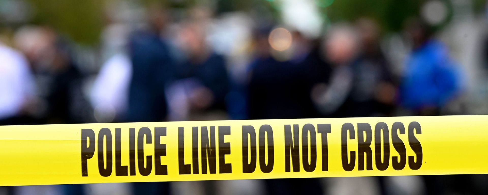 In this file photo Police tape secures a crime scene outside a club after a shooting in Brooklyn on October 12, 2019. - Sputnik International, 1920, 03.12.2021